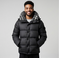 Premium authentic Burberry puffer jacket featuring the iconic “Burberry London England” sleeve patch and signature check-lined hood. This is a single resale item in excellent condition.